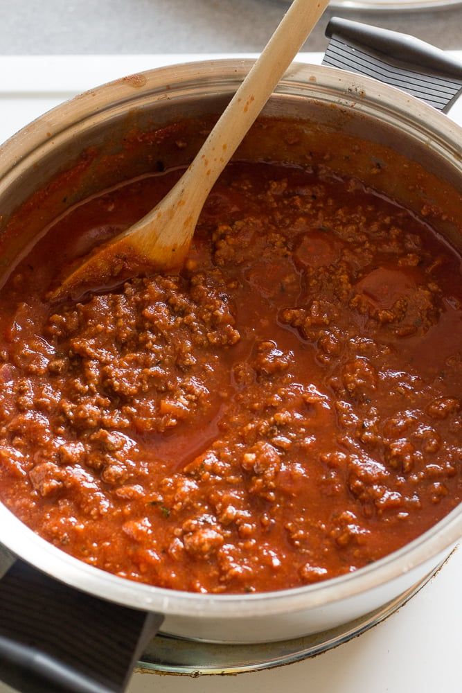 meat sauce simmering in a pot