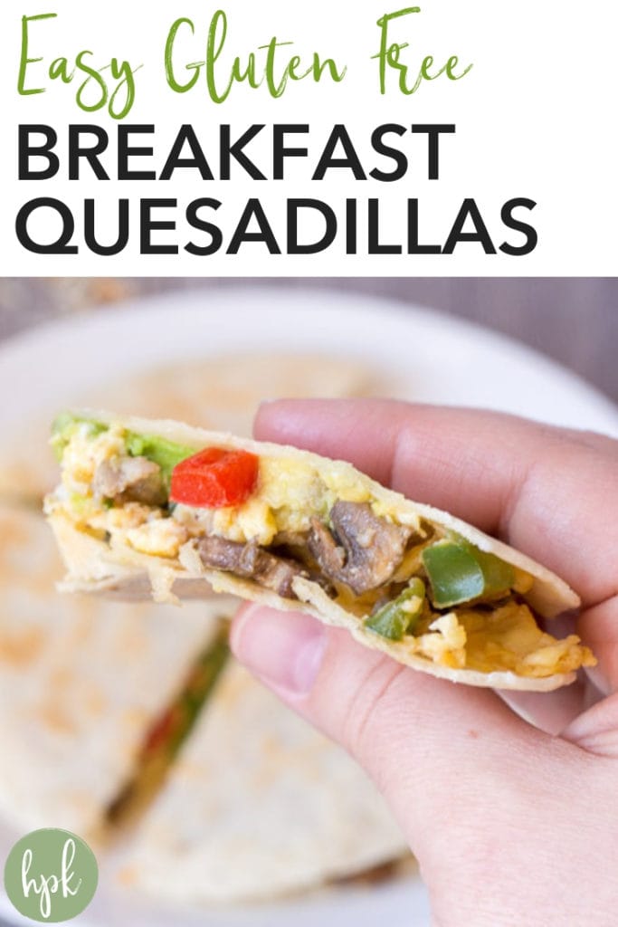 This Easy Gluten Free Breakfast Quesadilla is a quick recipe for when you've got hungry kids at the table. It has eggs, sausage, and cheese for protein, avocado for a healthy fat, and even some veggies too. A filling meal before you head out the door. Click to get the recipe! #glutenfree #breakfast #quesadilla