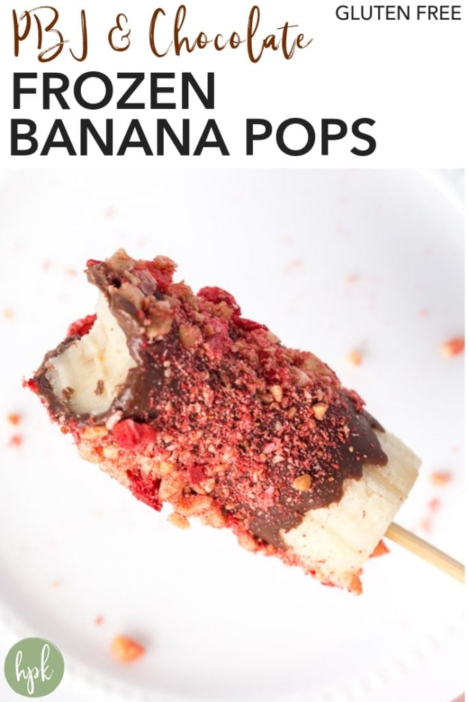 These Peanut Butter & Jelly Chocolate Dipped Frozen Banana Pops turn a classic into a healthy treat! A fun recipe for kids to make, they're a great gluten free dessert for hot summer days. #dessert #glutenfree