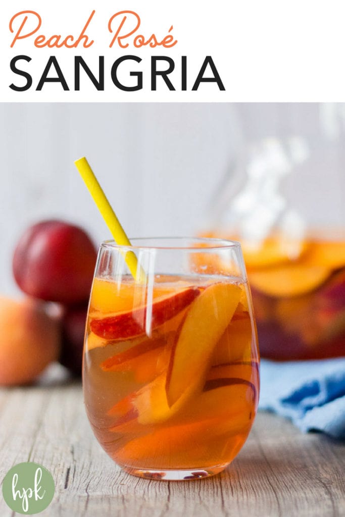 This Peach Rose Sangria recipe is perfect for spring, summer, or even warm fall weather. It uses both peaches and nectarines with just a little bit of sugar, plus grapefruit sparkling water for bubbles. It’s an simple and easy drink option for a crowd, so add it to the menu for your next gathering! #sangria #peach #rose #drinks #glutenfree