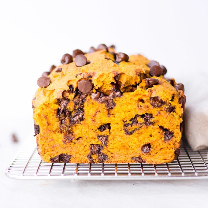 straight on shot of gluten free chocolate chip pumpkin bread that's been cut into