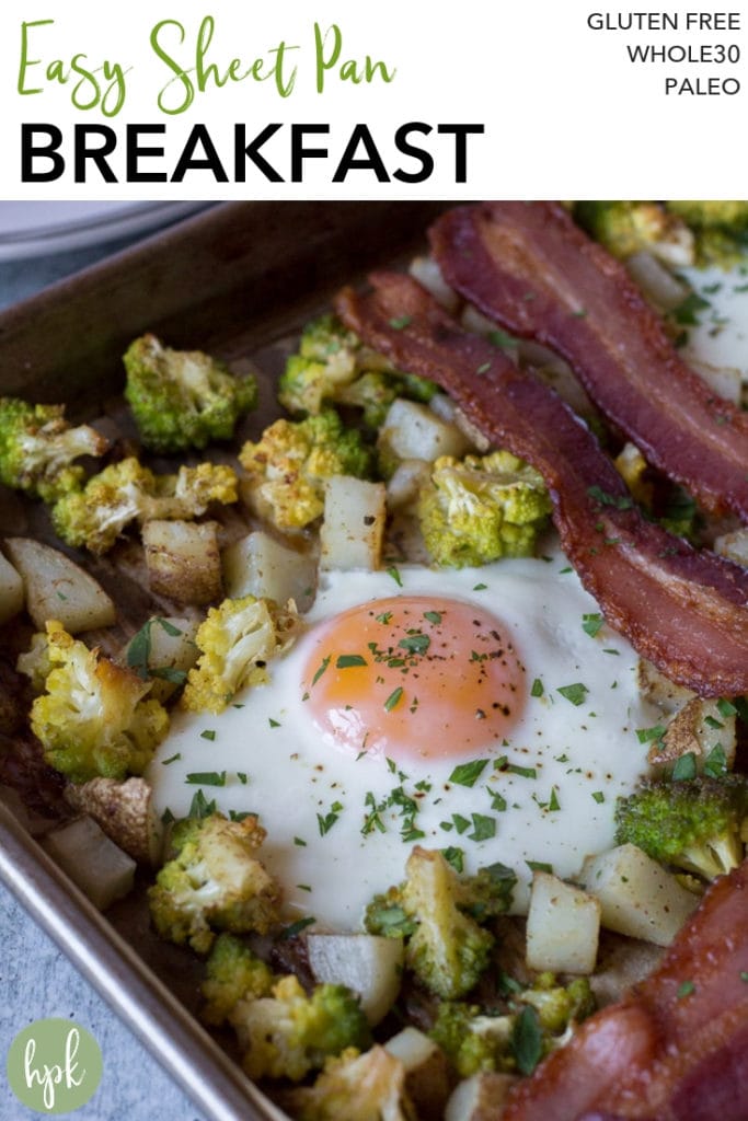 This Easy Sheet Pan Breakfast is a healthy, gluten free and Whole30 version of a morning meal. Oven baked using parchment paper to keep the bacon, eggs, and potatoes from sticking, it's super simple to make and will become a fast favorite! #glutenfree #breakfast #whole30