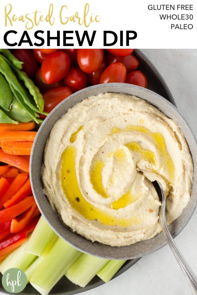 This Roasted Garlic Cashew Dip recipe is paleo and vegan, and packs a ton of flavor. It’s a healthy, dairy free appetizer that is both adult- and kid-approved! #paleo #dip