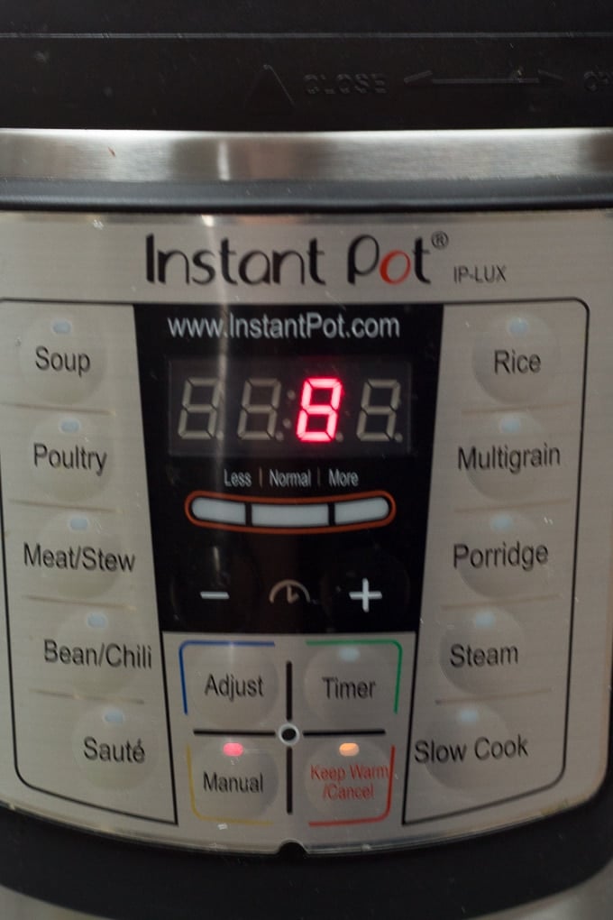 A timer set to 8 minutes on an Instant Pot.