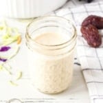healthy paleo coleslaw dressing in a jar with slaw accompaniments