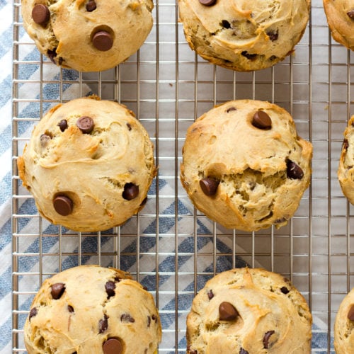 top down shot of banana chocolate chip muffins on a wire rack