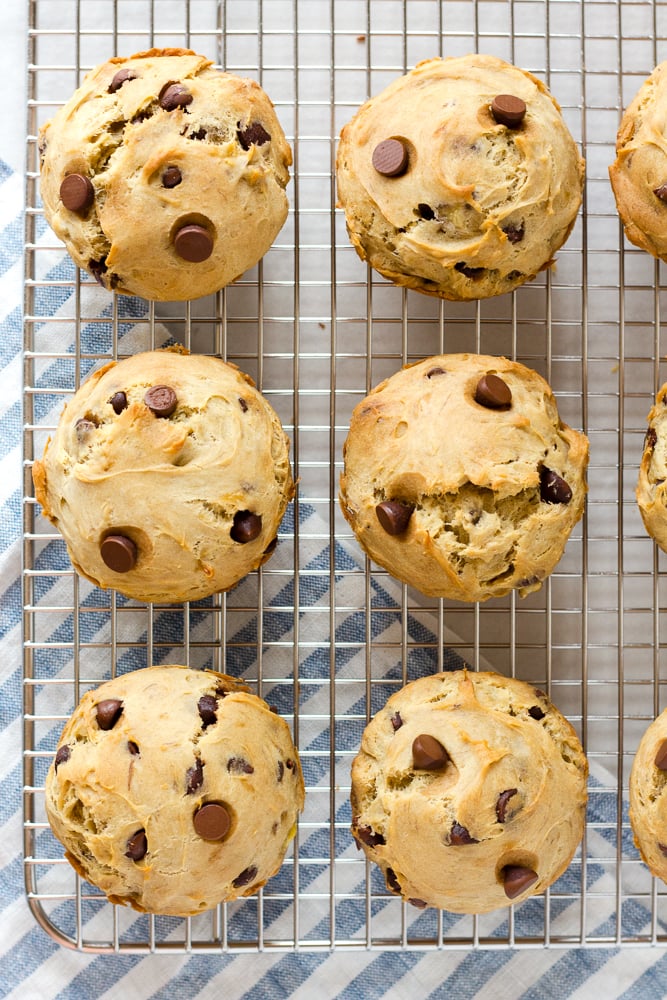 top down shot of banana chocolate chip muffins on a wire rack