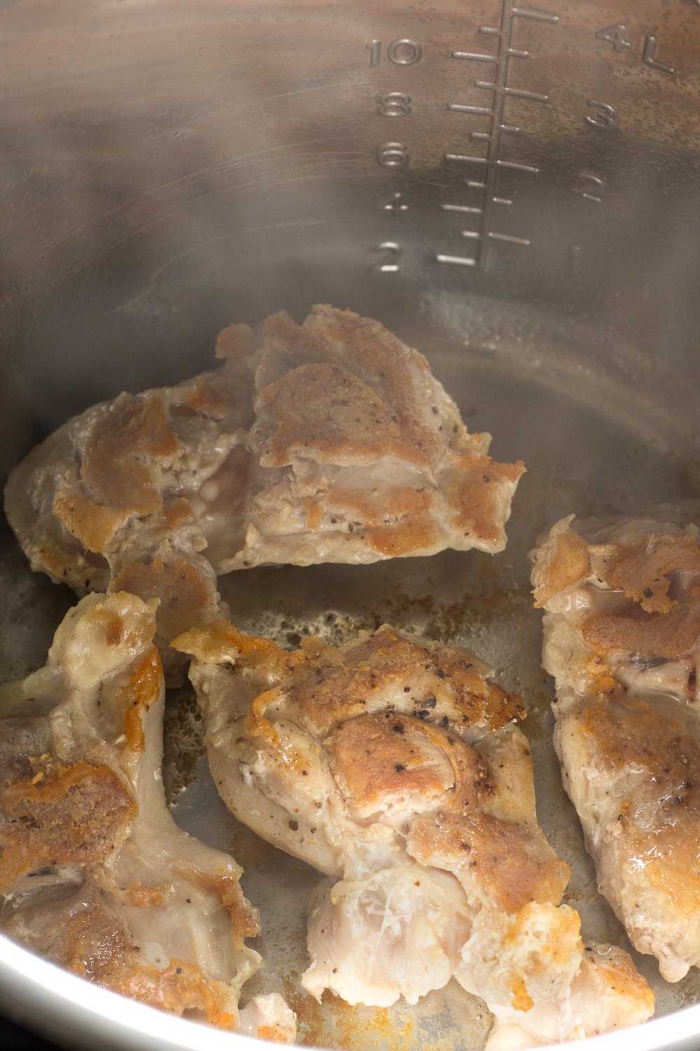 Seared chicken thighs in the Instant Pot.