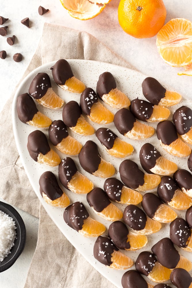 chocolate covered orange slices on a plate