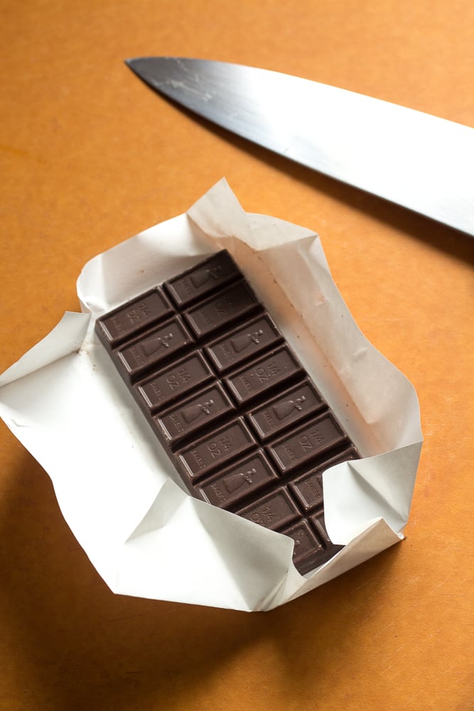 bar of chocolate on cutting board.