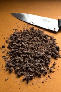chopped chocolate on a cutting board