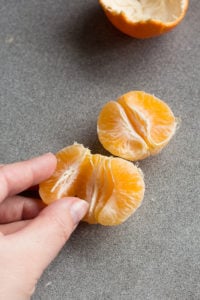 separating orange slices