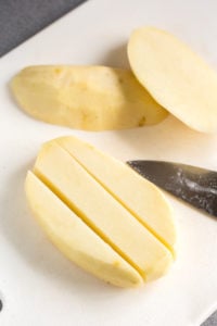 cutting potatoes into strips