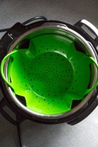 green colander in instant pot insert