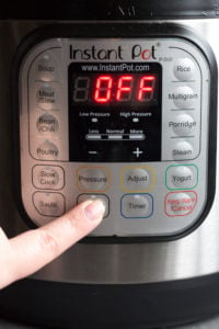 pressing manual button on instant pot