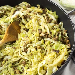 ground beef and cabbage stir fry in a pan