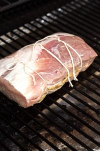 stuffed pork loin roast on a grill