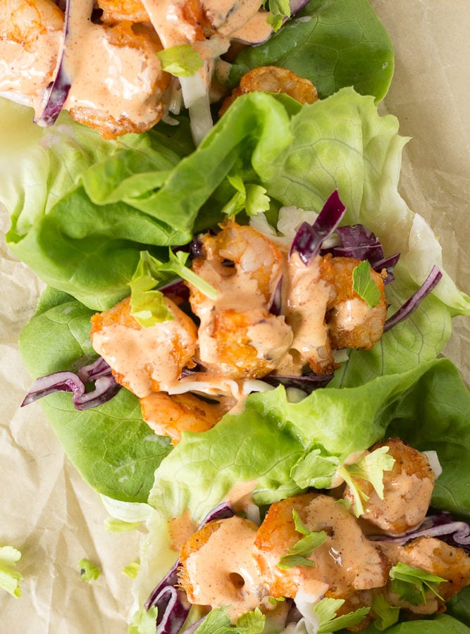 top down shot of whole30 grilled shrimp tacos in lettuce