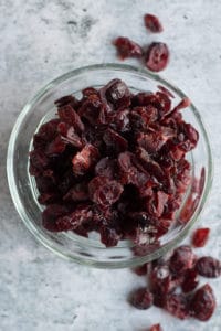 dried cranberries in a small glass bowl