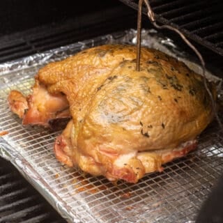 a smoked turkey breast on a Traeger grill.