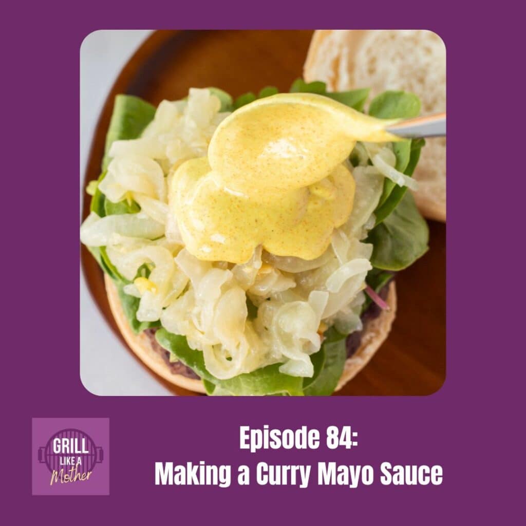promo image for Grill Like A Mother podcast episode 84: Making a Curry Mayo Sauce. An zoomed in shot of a small spoon pouring yellow curry sauce over a burger topped with greens and sauteed onions on top of a dark wooden plate is shown on a dark purple background with white text at the bottom showing the episode name and number.