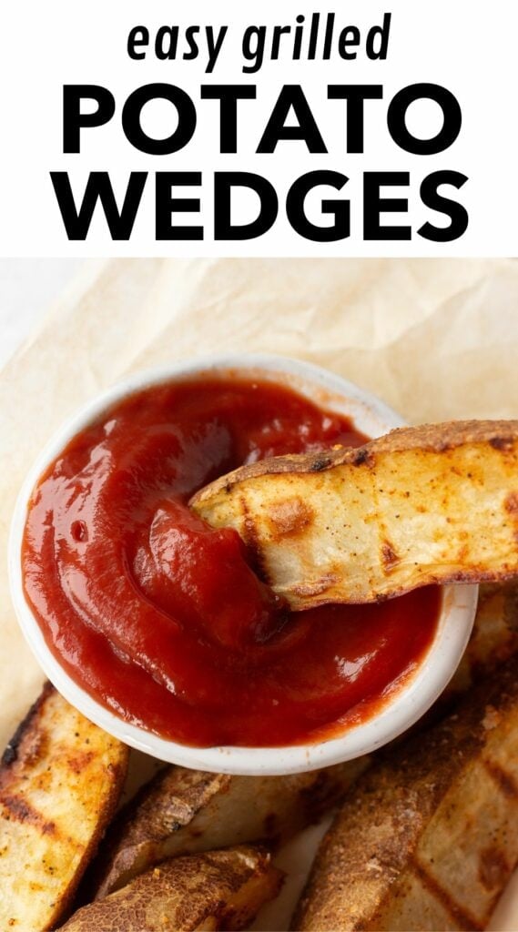 pin for easy grilled potato wedges, with that phrase in black text at the top and an image of a potato wedged being dipped in a small bowl of ketchup on the bottom.